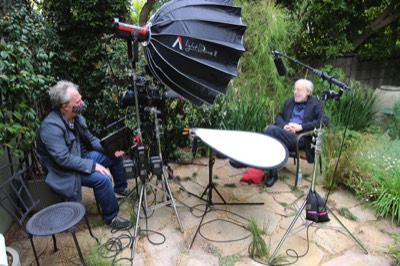  Filming interview by director Dan Raim with film critic Kenneth Turan. 